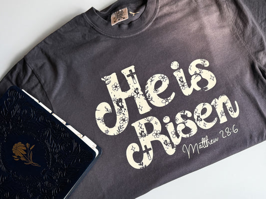 He is Risen Easter Comfort Colors Tee, Beige on Graphite/Blue Spruce